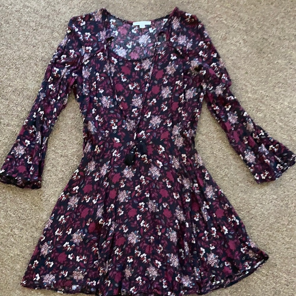 Fall dress with bell sleeves.